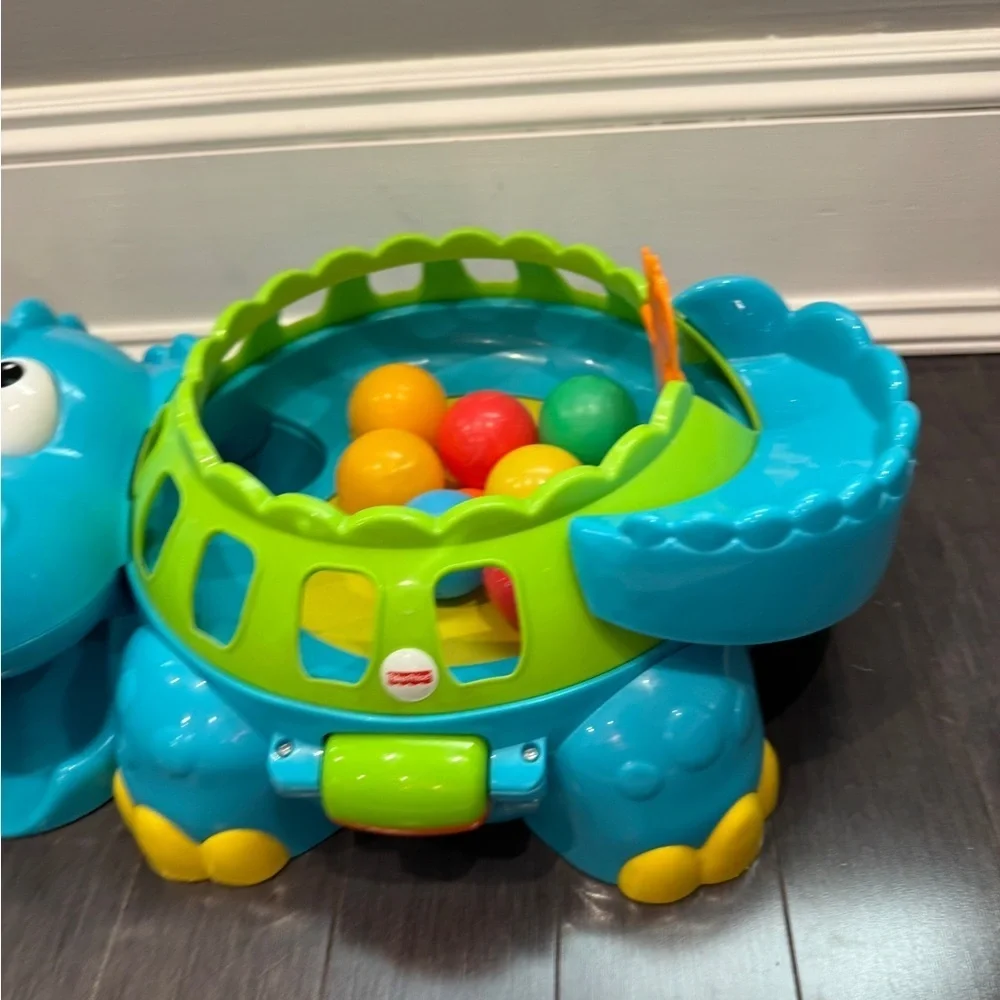 Fisher-Price Go Baby Go! Poppity Pop Musical Colorful Dinosaur Ball Toy Toddler